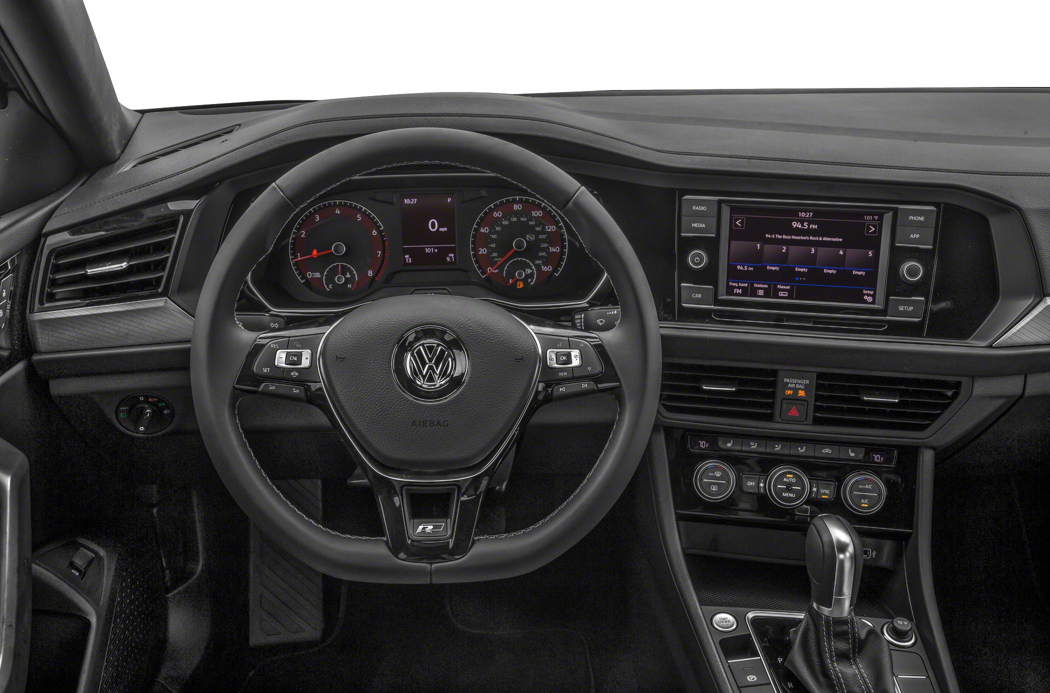 Modern dashboard, multifunction steering wheel, digital gauges, and central infotainment display