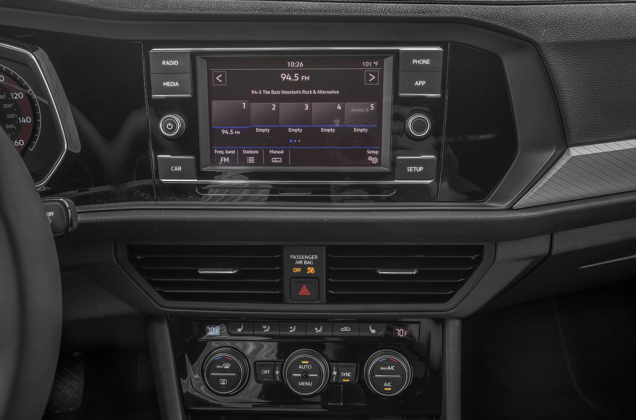 Infotainment system and climate control panel in car dashboard