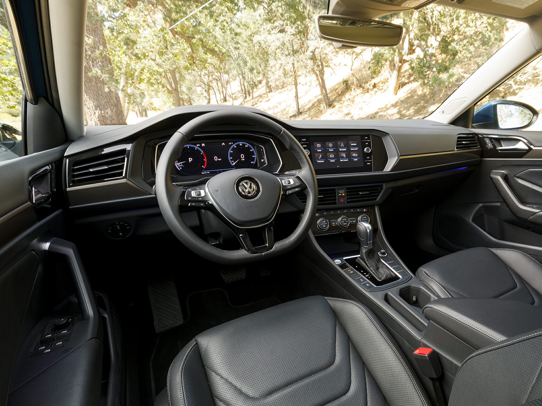 Digital dashboard and touchscreen infotainment with modern steering wheel and seats