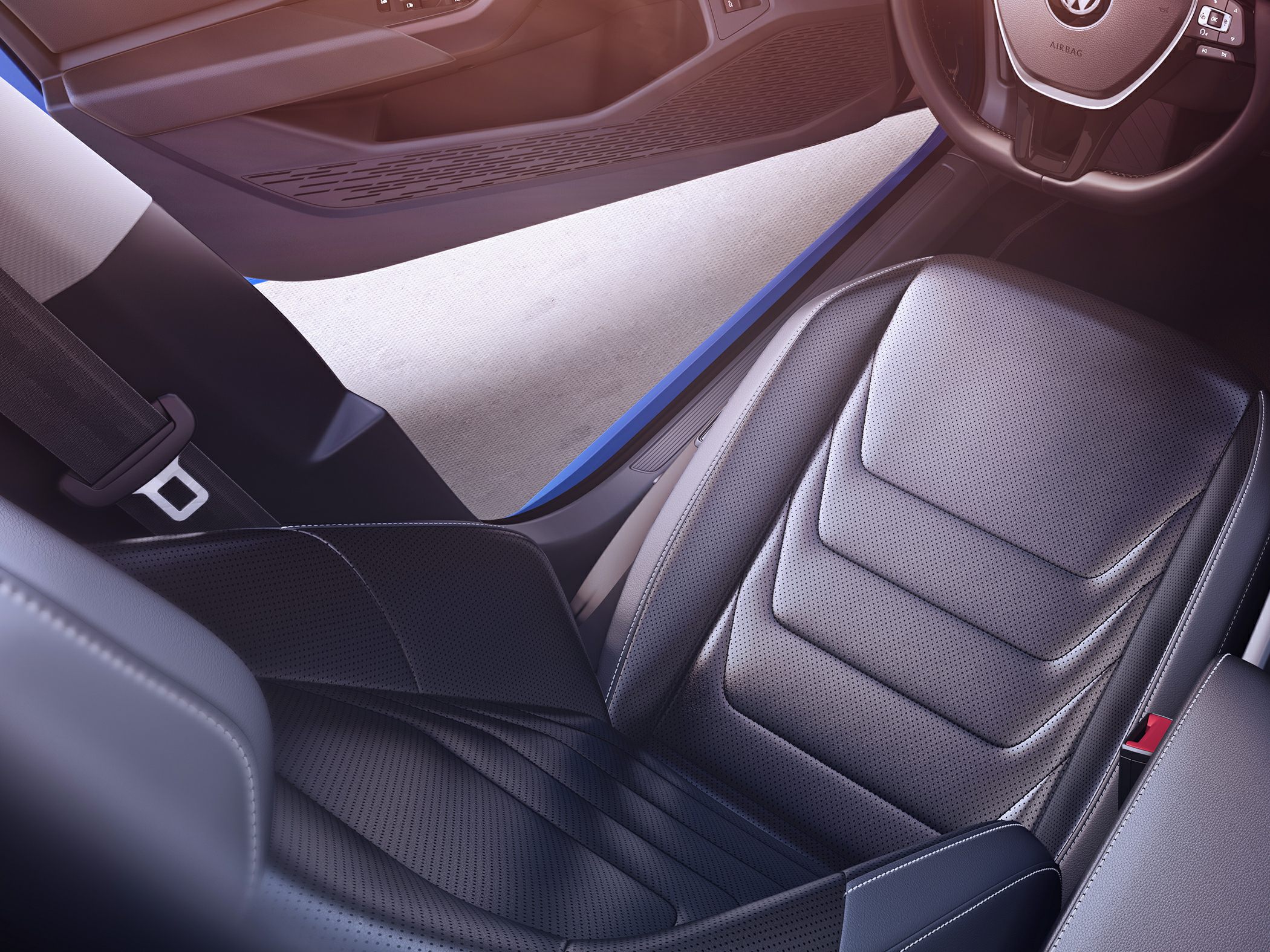 Luxurious black leather front seat with detailed stitching