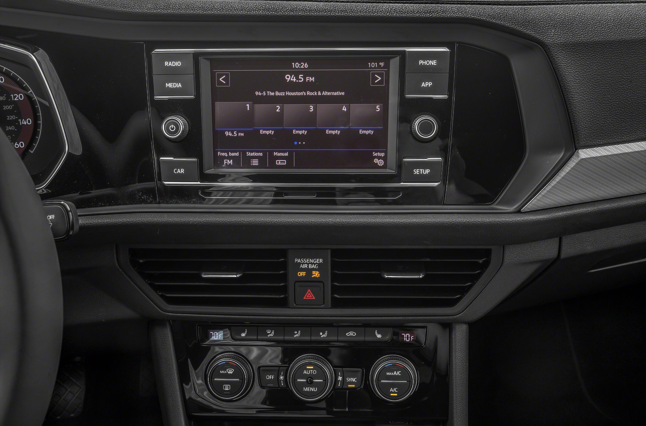 Infotainment touchscreen and dual-zone climate control panel with seat heating controls