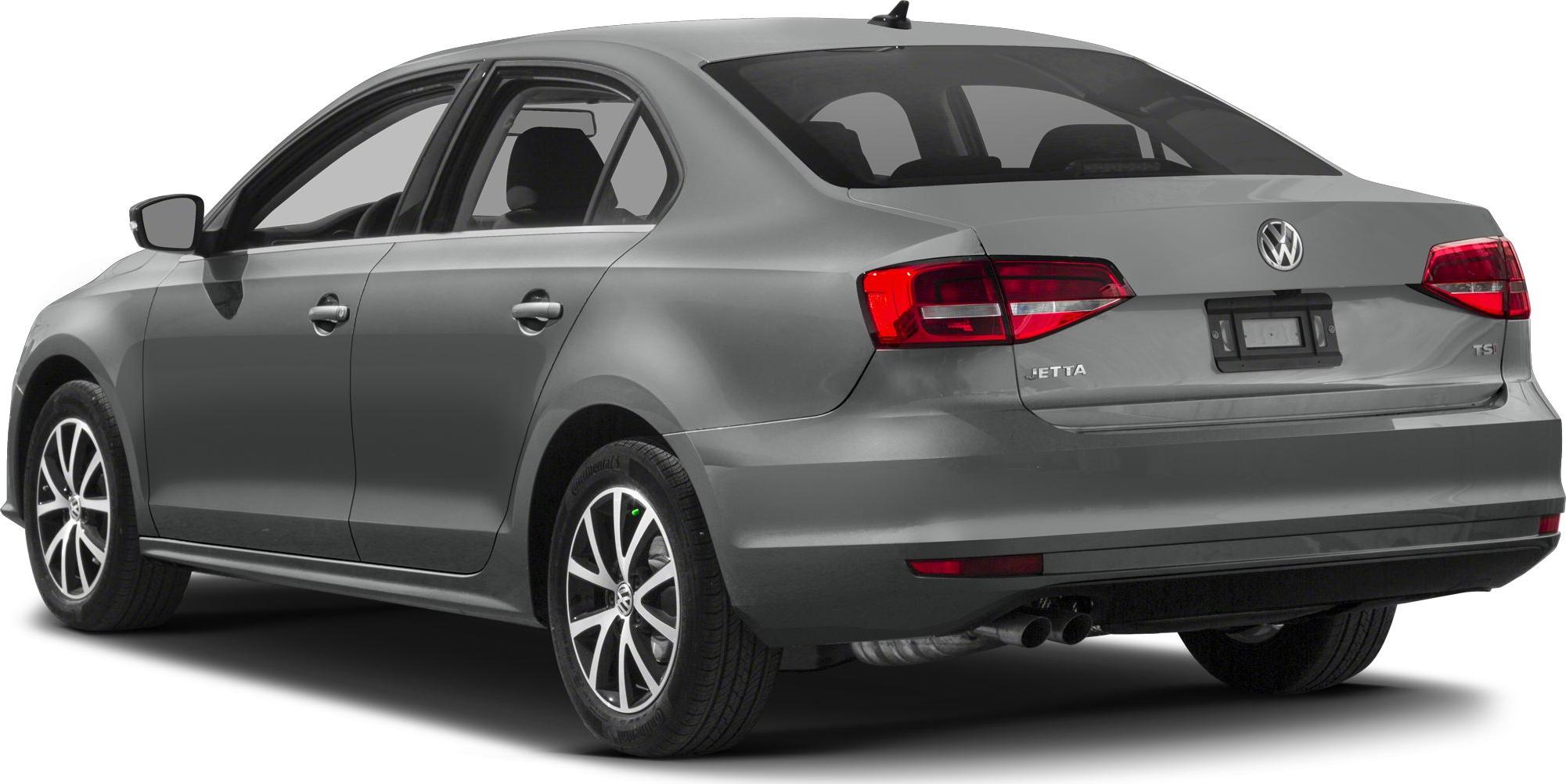 Side-rear view of a sedan with dual exhaust and alloy wheels