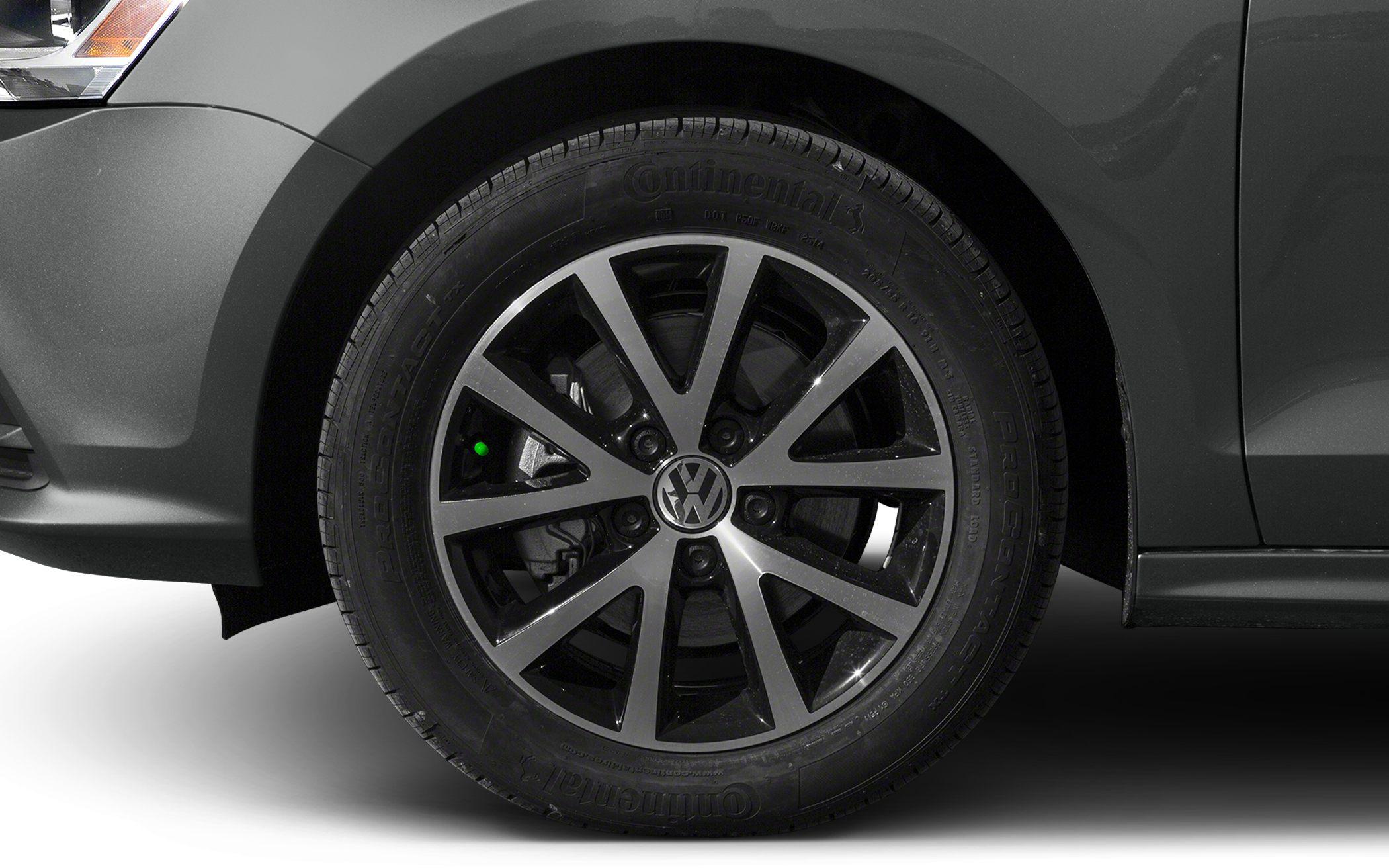 Close-up of alloy wheel with Continental tire on sedan