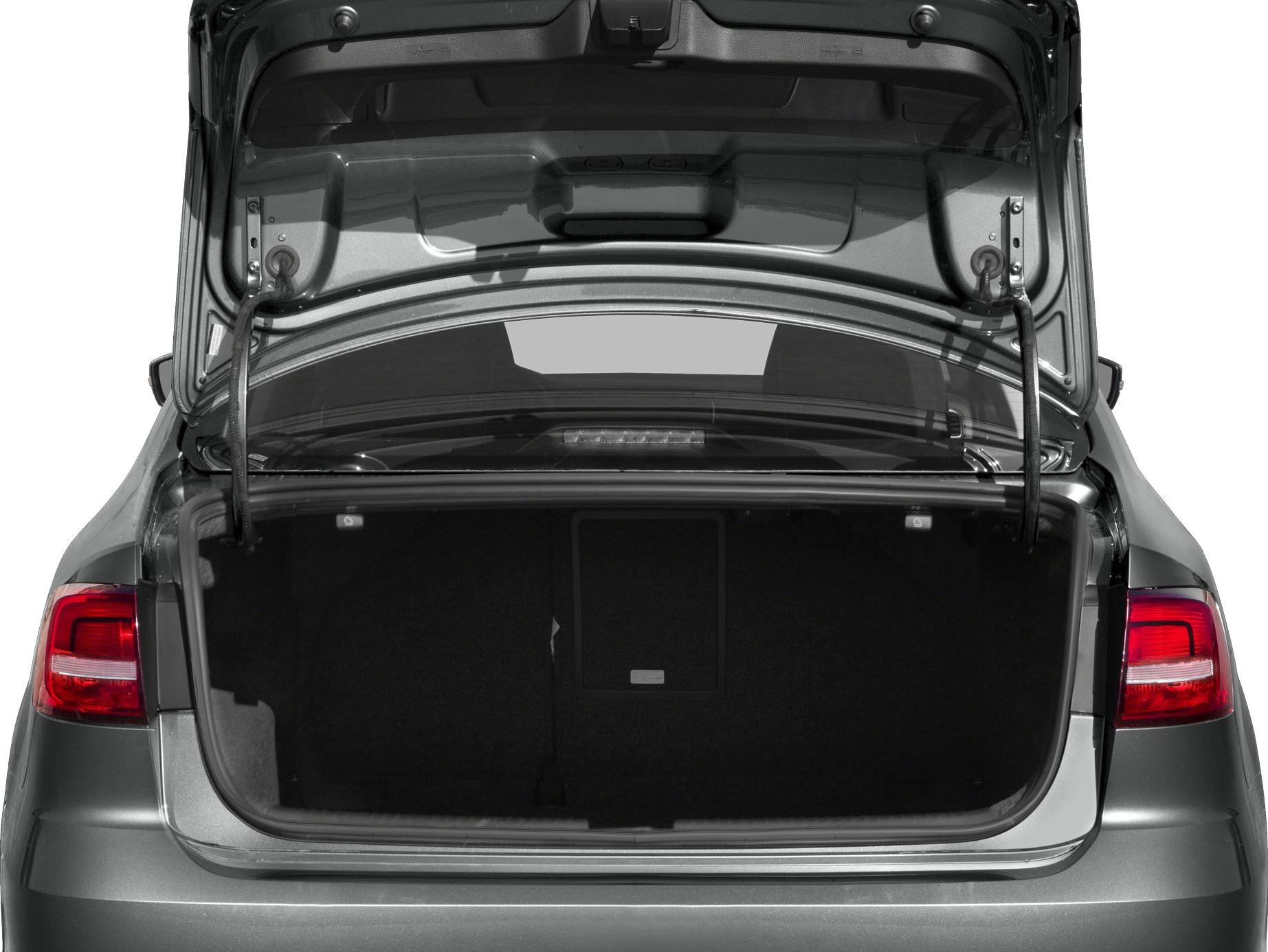 Open, spacious car trunk with visible hinges and taillights
