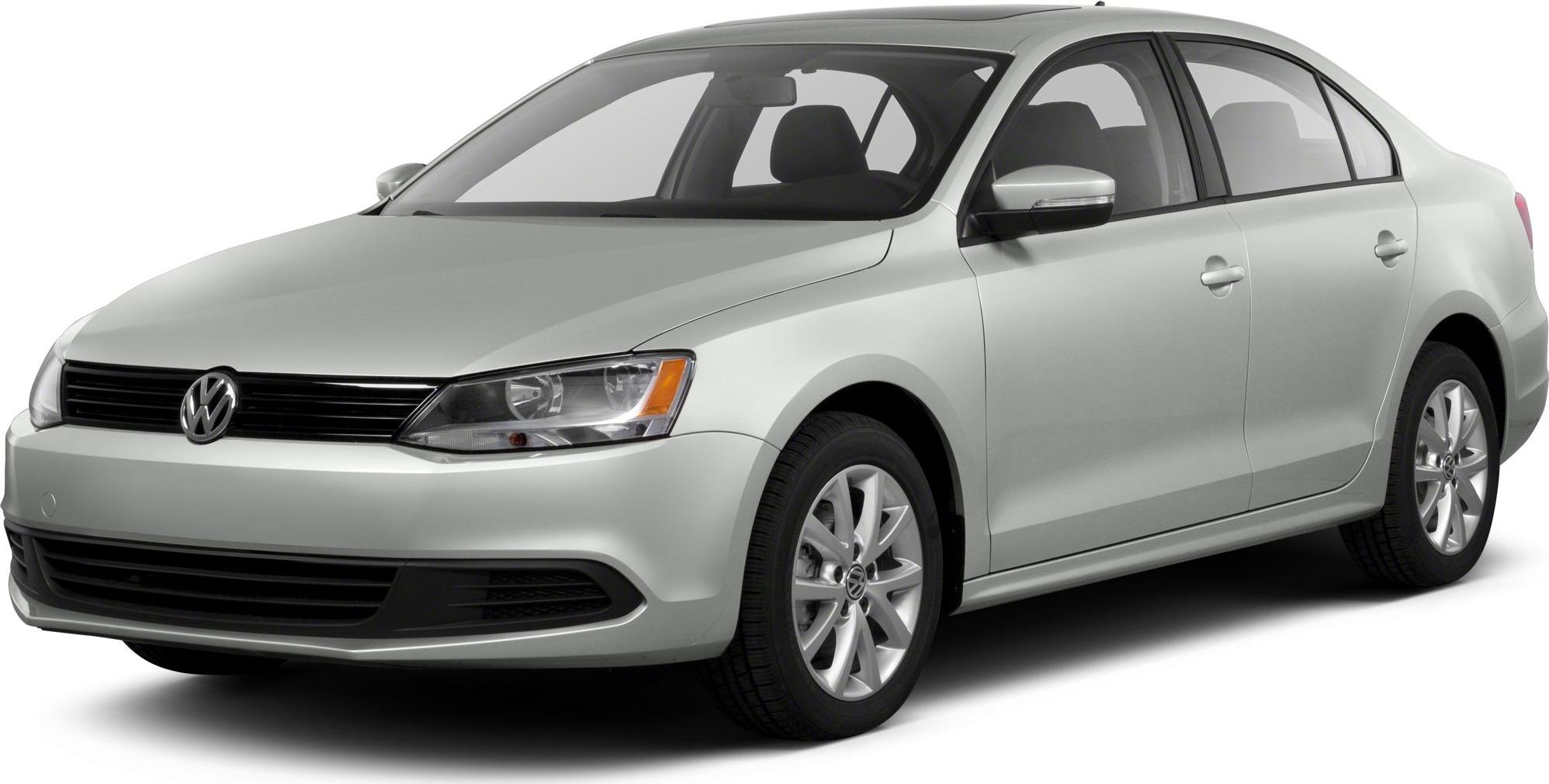 Front angle view of silver sedan with detailed headlights and alloy wheels