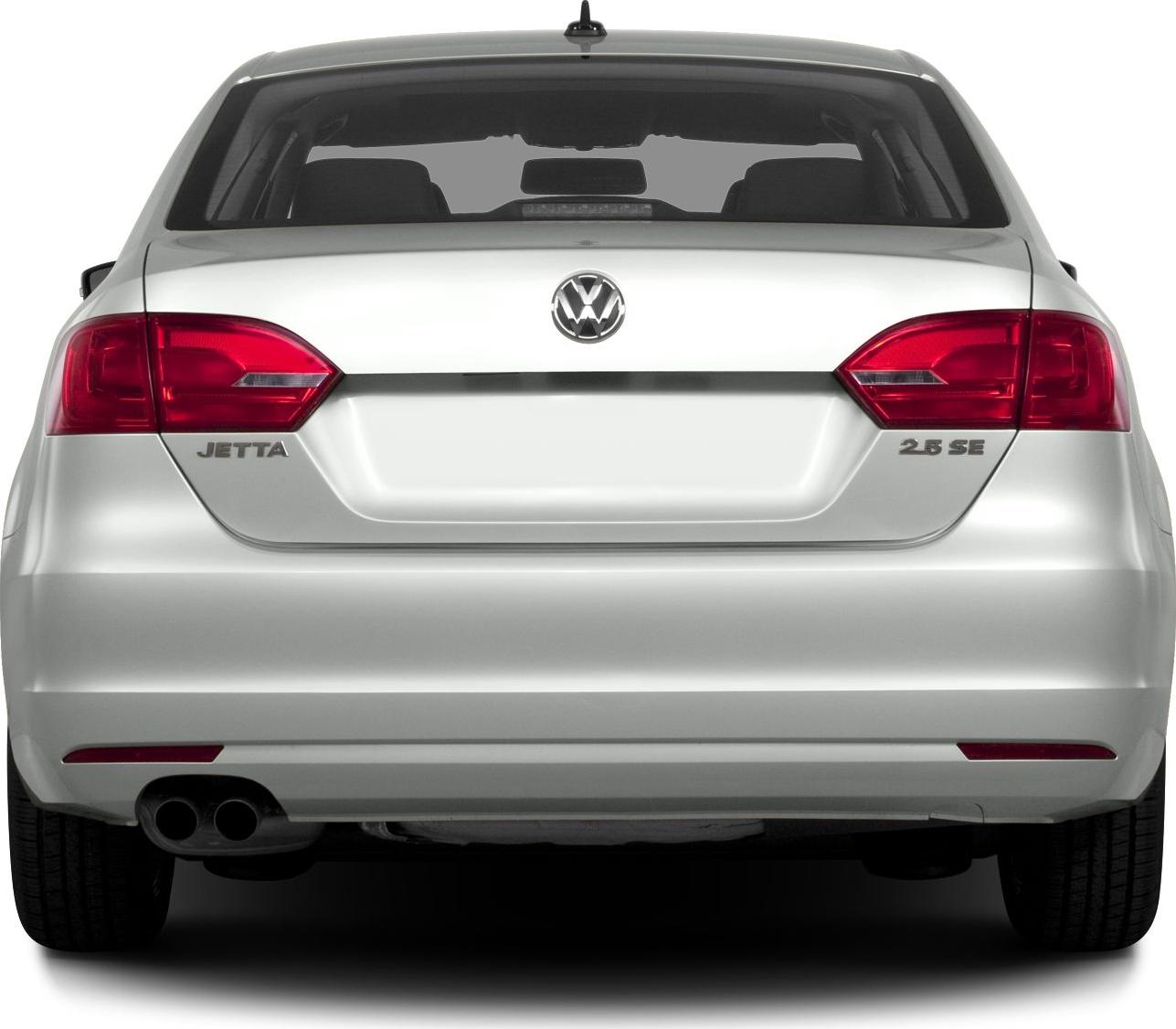 Rear view with taillights, dual exhaust, trunk, and emblem