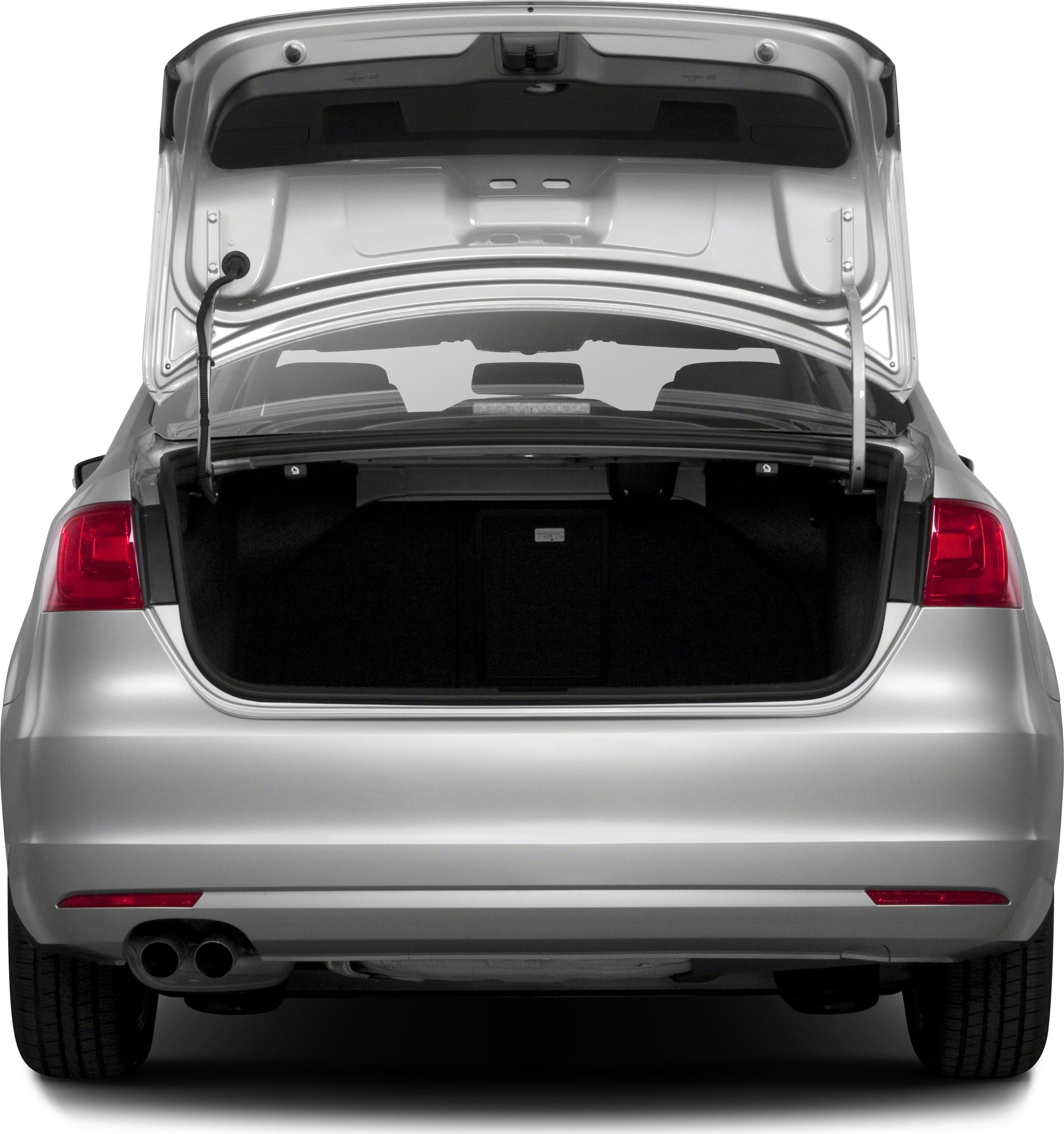 Open trunk and rear view with taillights of a sedan