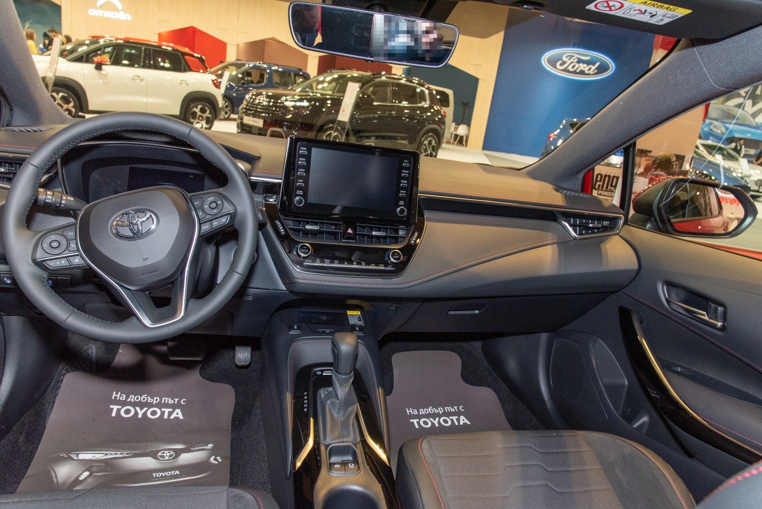 Modern dashboard and multi-function steering wheel with touchscreen display