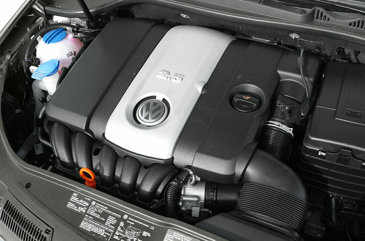 Engine bay with 2.5L inline configuration and VW emblem