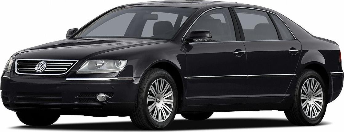 Front and side view of a luxury sedan with sleek headlamps and distinctive wheels
