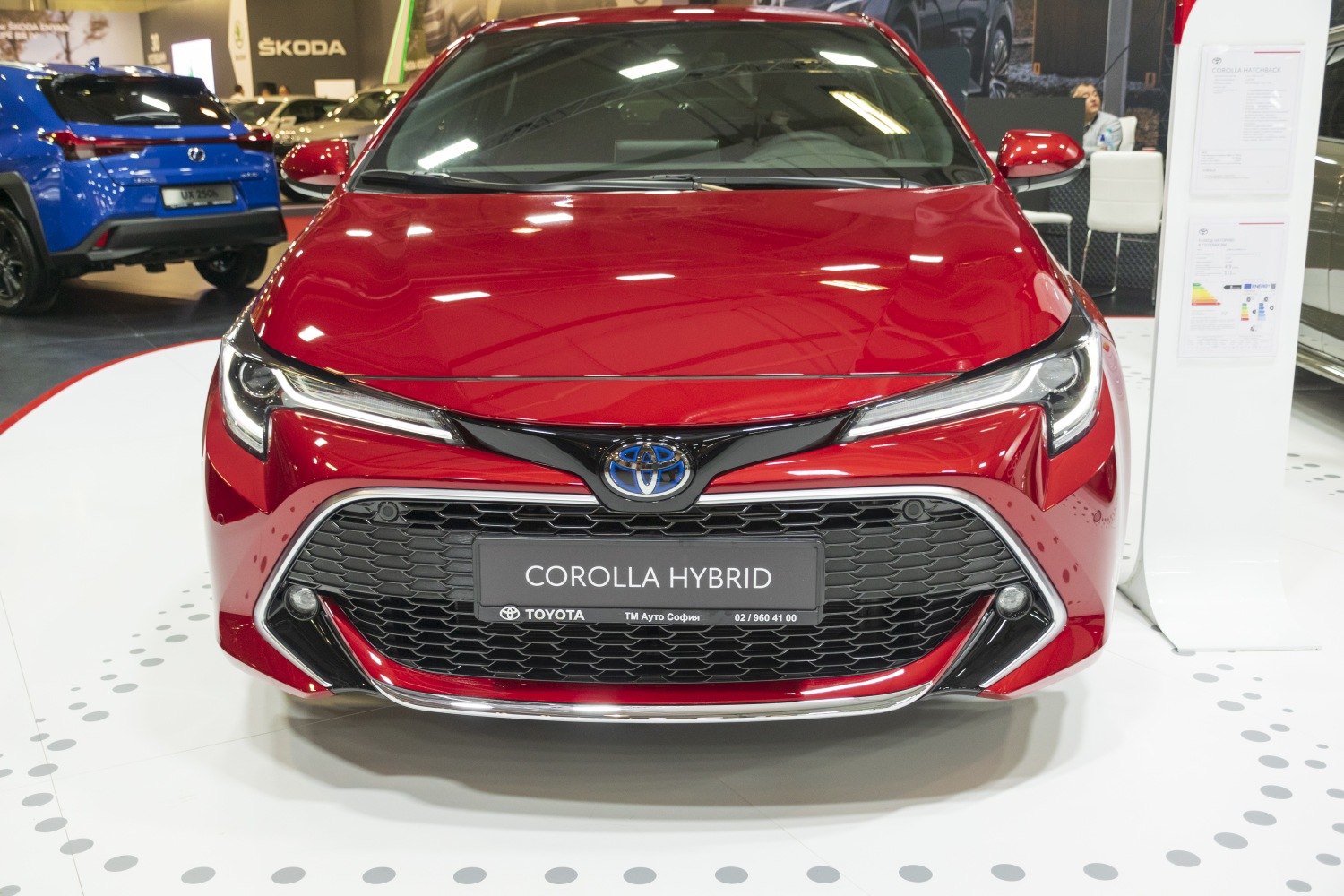 Front view of hybrid car grille and LED headlights