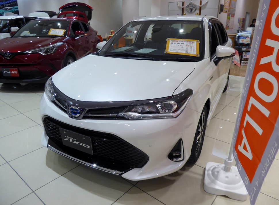 Front and headlight design of a showroom hatchback car