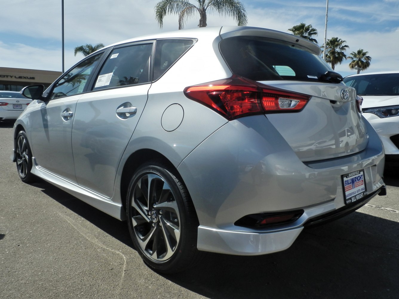 Rear side of hatchback with LED taillights and alloy wheels