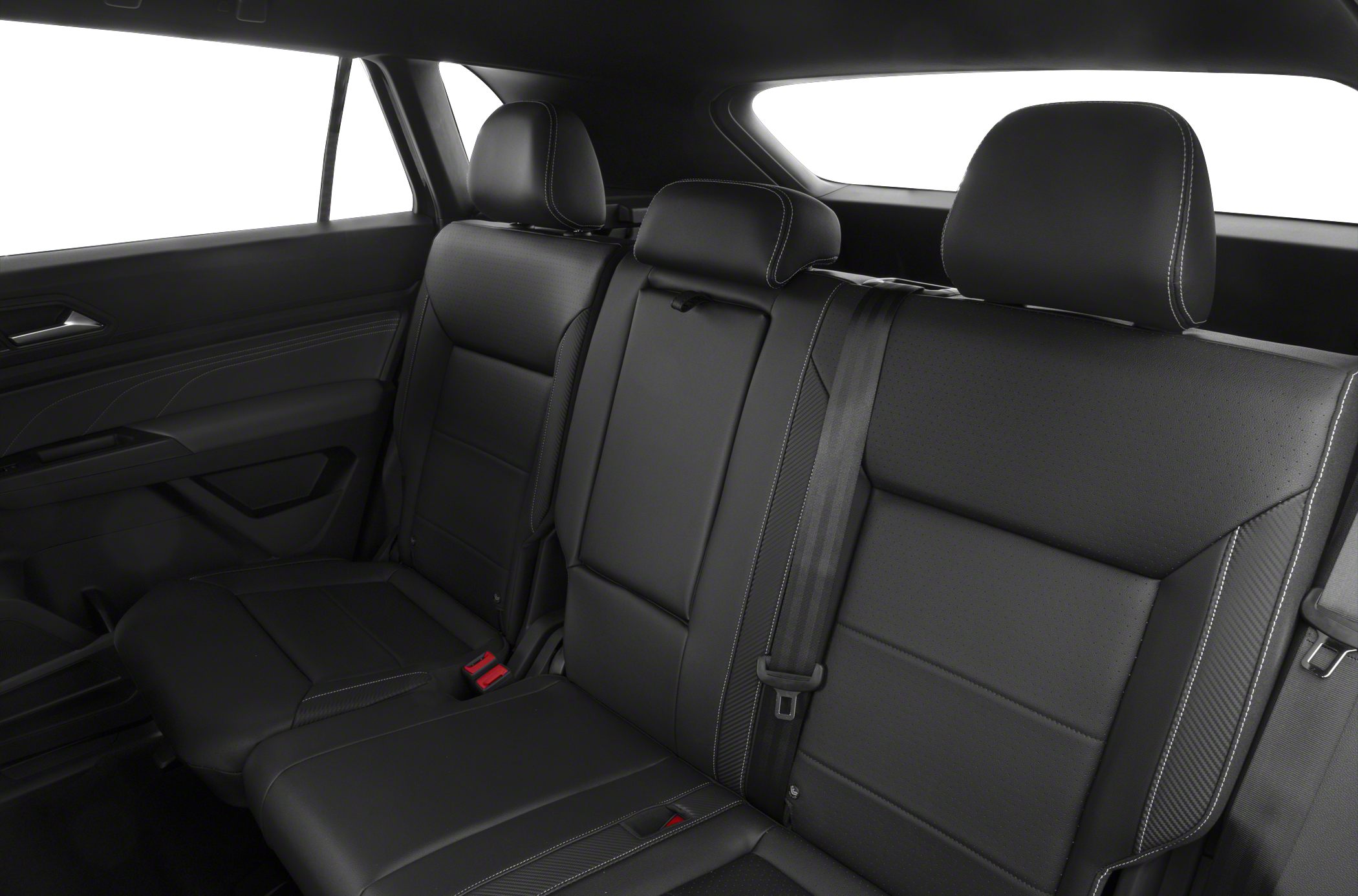 Black leather rear seats with white stitching and integrated headrests