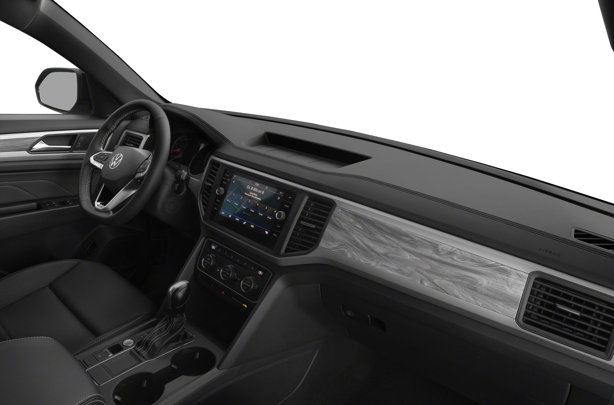 Interior dashboard and center console with infotainment, steering wheel, wood trim