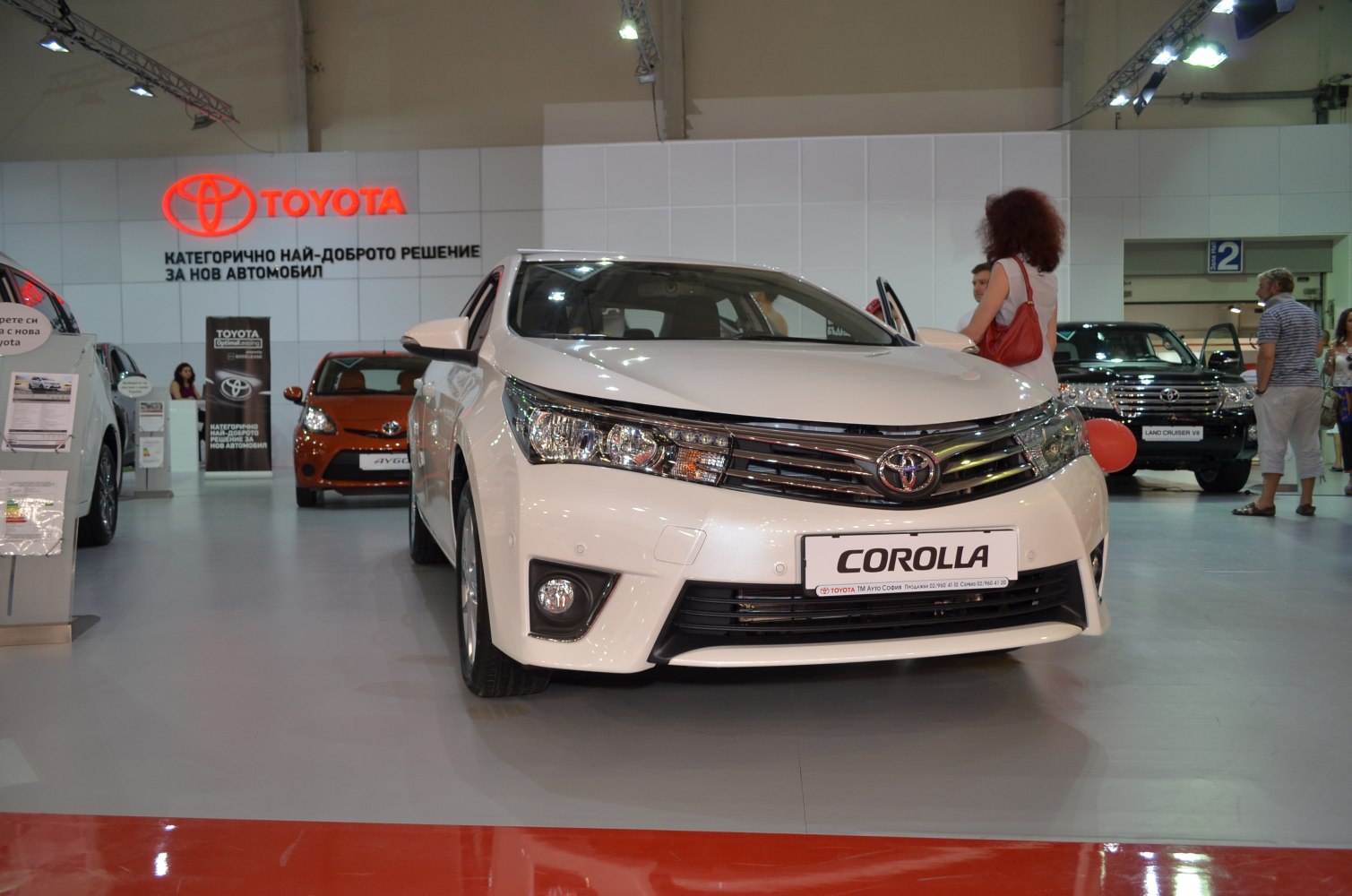 Front fascia with grille and headlights of a modern sedan