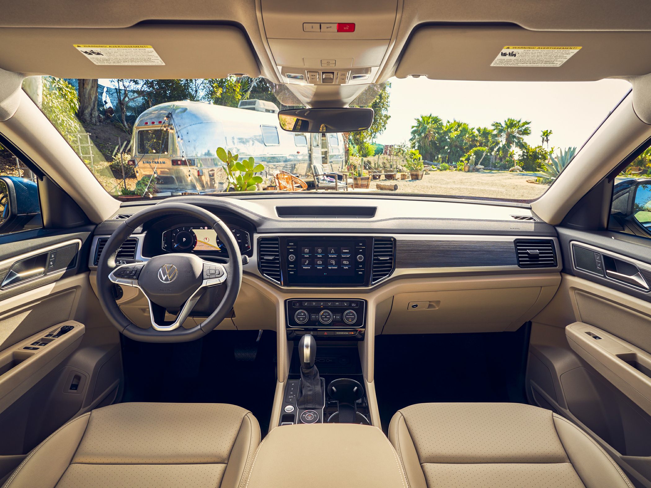 Beige interior with digital dashboard and touchscreen infotainment