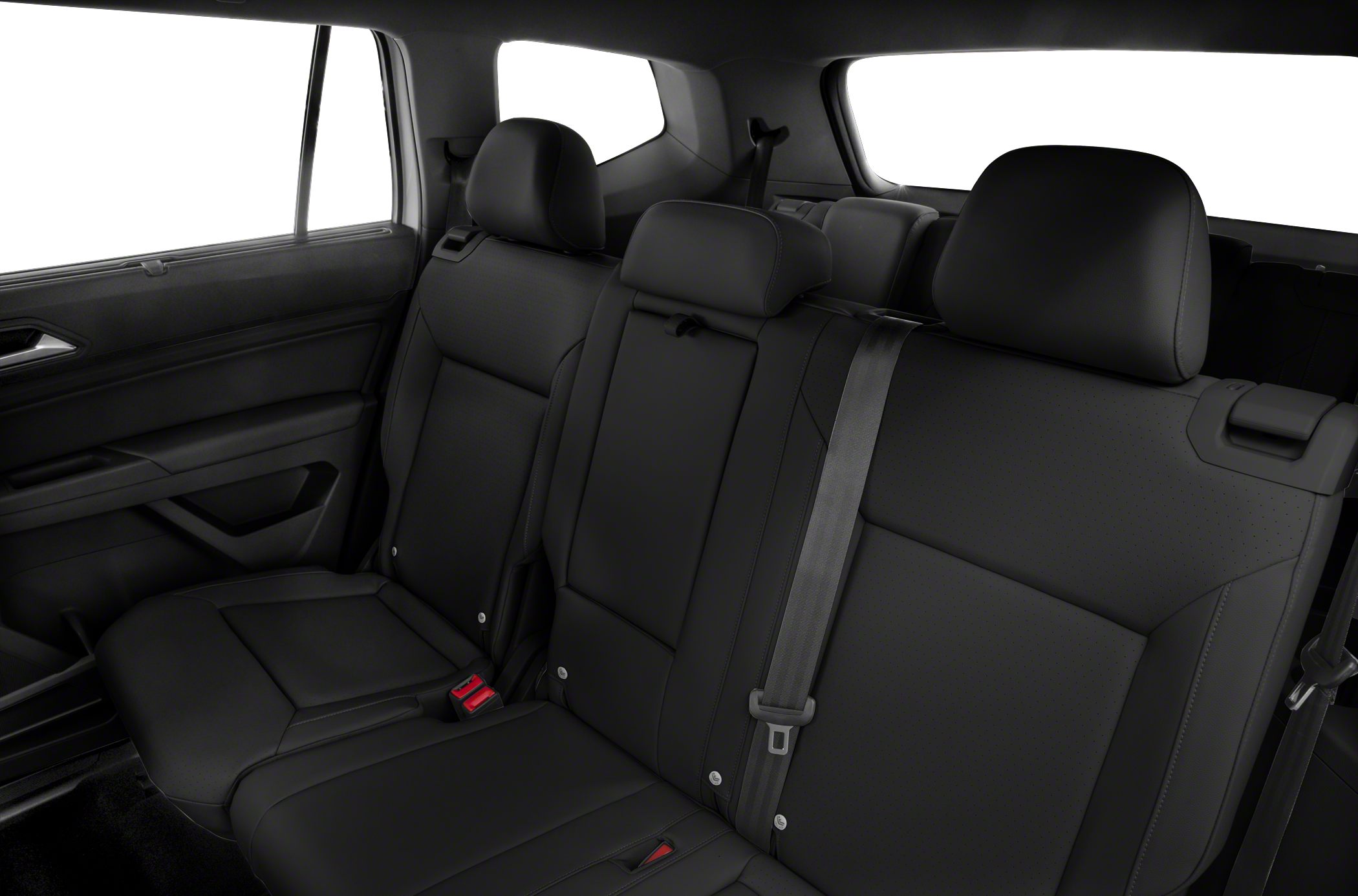 Black leather rear seats with headrests and seat belts in a modern SUV interior.