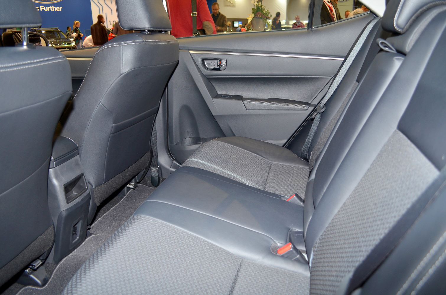 Rear seat interior with fabric and leather upholstery