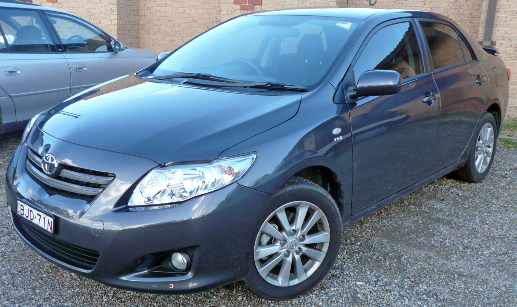 Sleek front side view of a 2007 compact sedan with alloy wheels