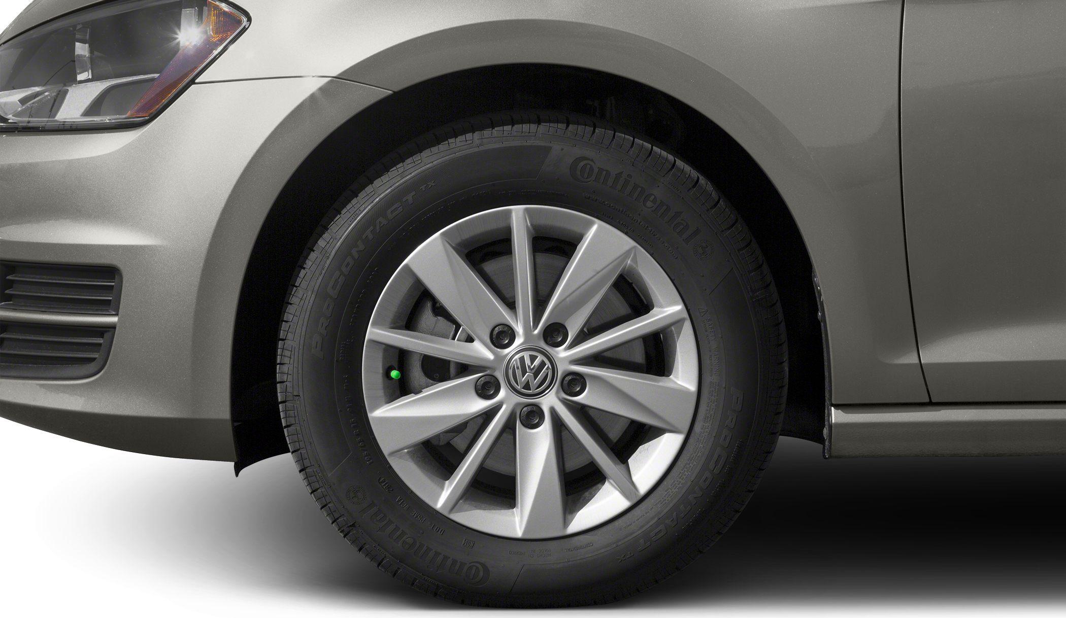 Close-up of alloy wheel and tire with Volkswagen logo
