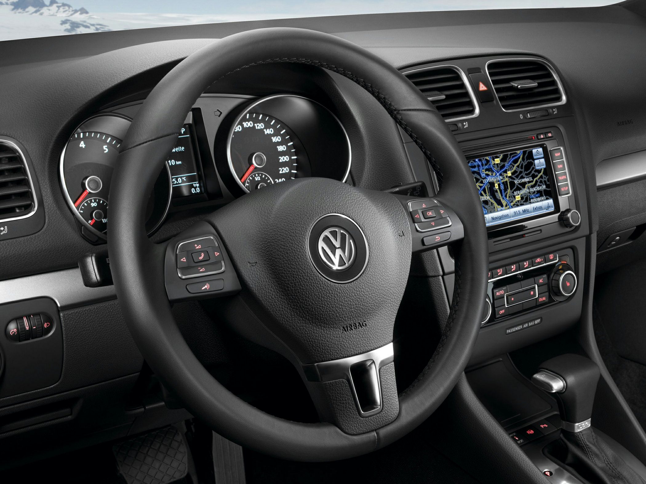 Steering wheel, instrument cluster, infotainment system and dashboard controls