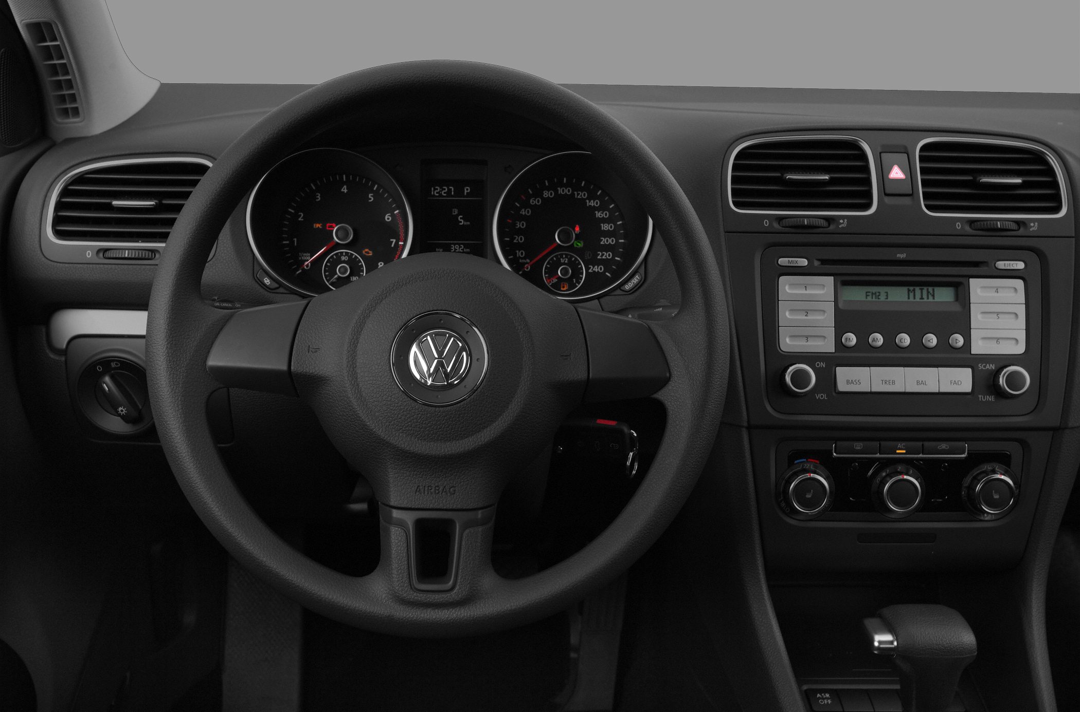 Steering wheel and dashboard with instrument cluster and center console