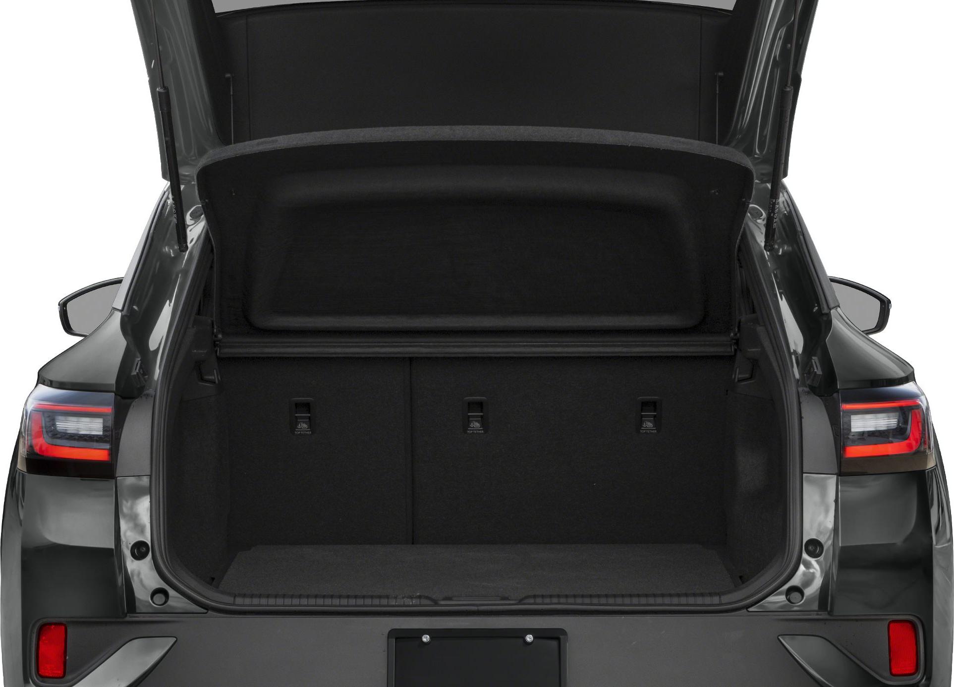 Open trunk space with visible rear storage features and rear lights.