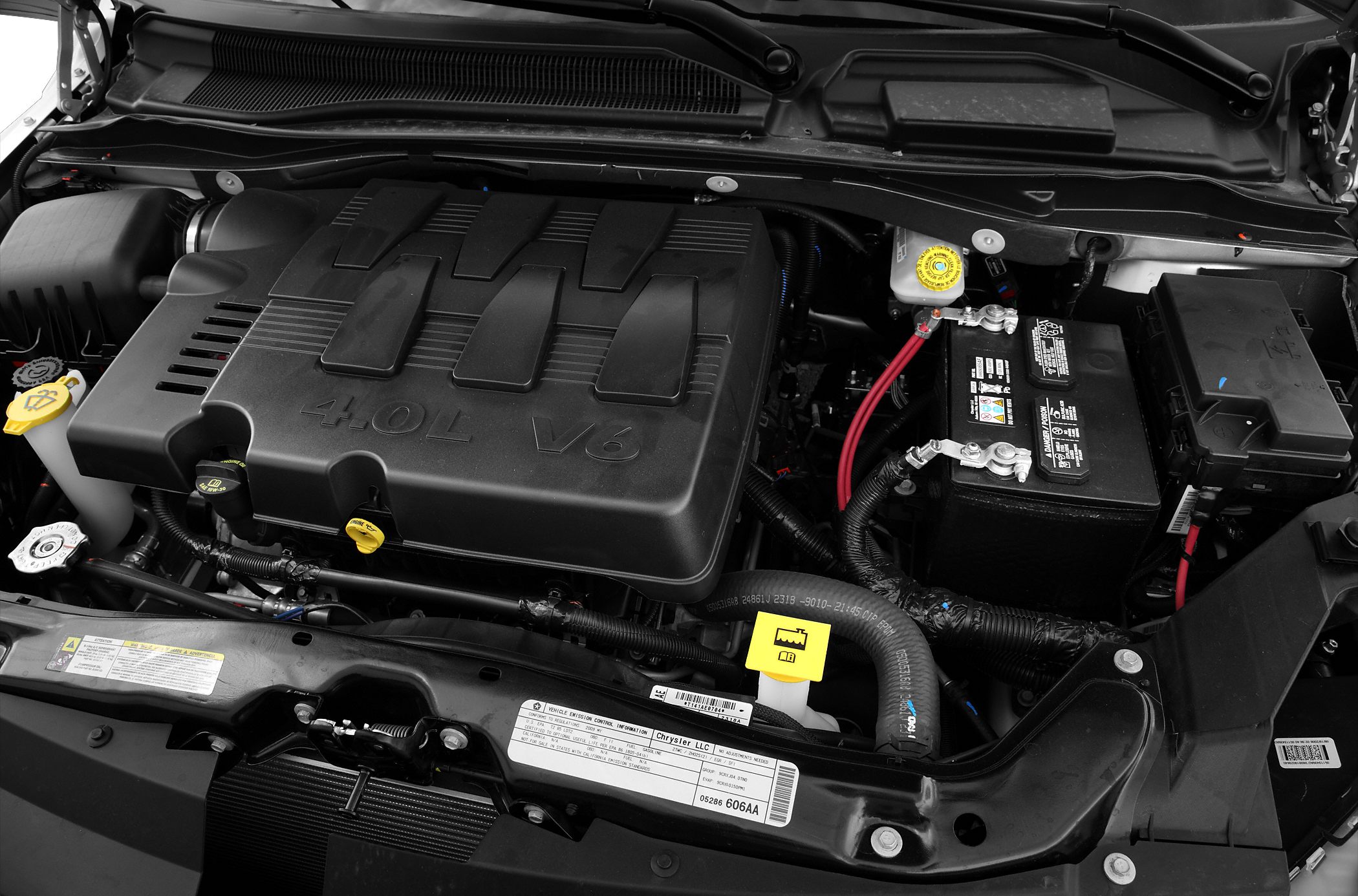 4.0L V6 engine bay with battery and fluid reservoirs