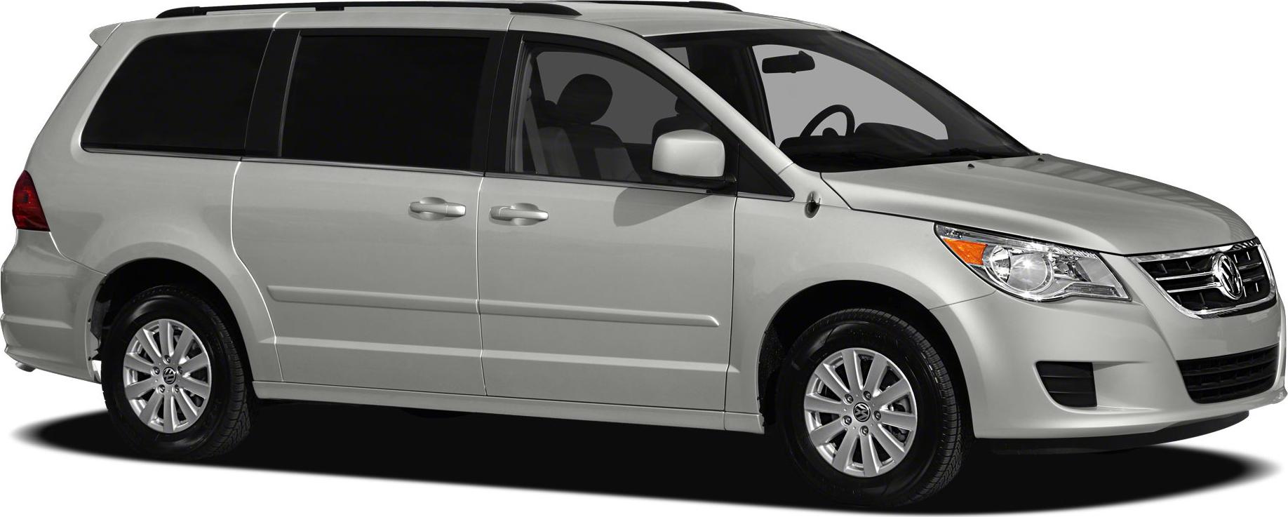 Side profile of a minivan with sliding doors and chrome grille