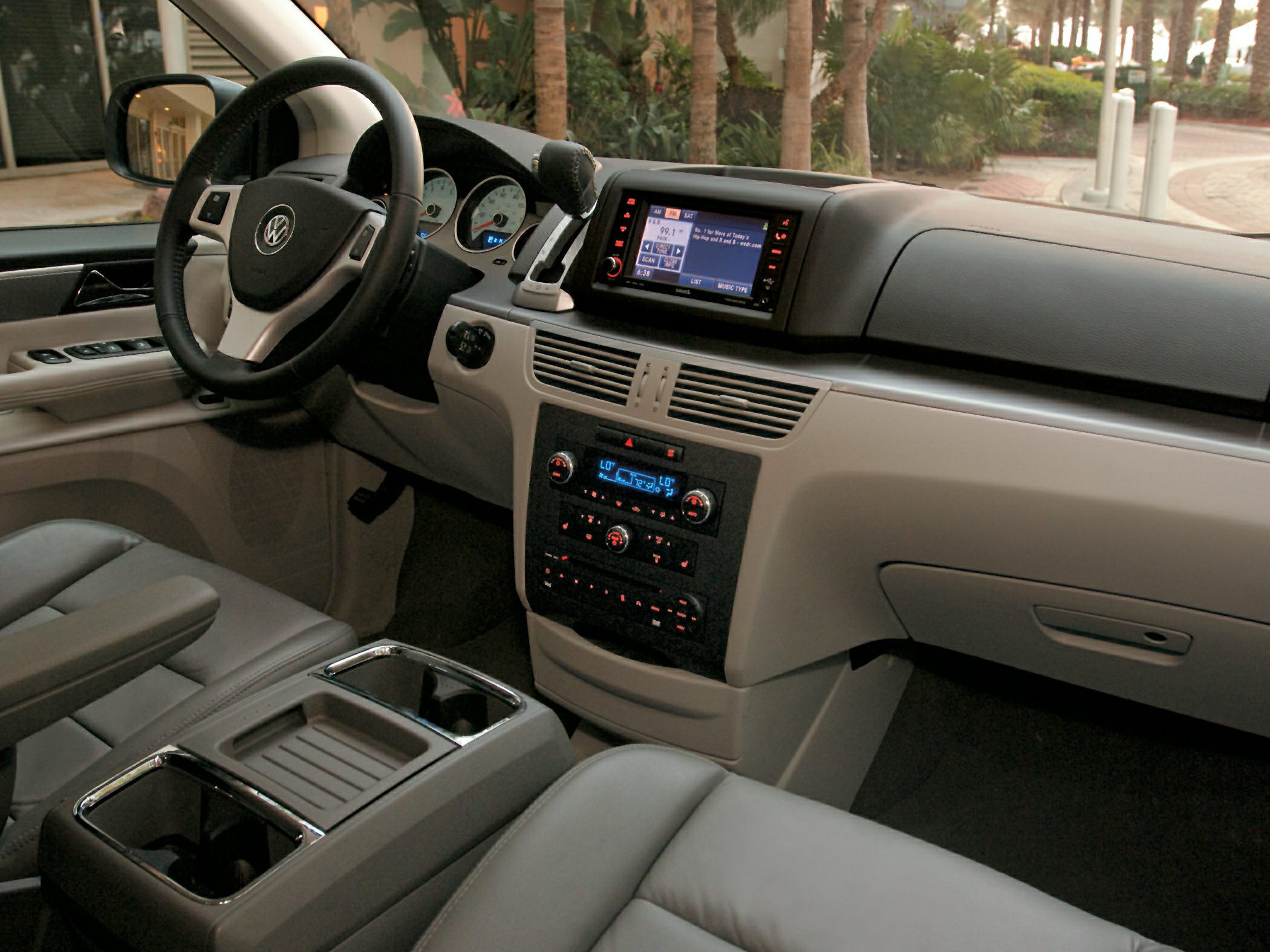 Dashboard, steering wheel, and center console with controls