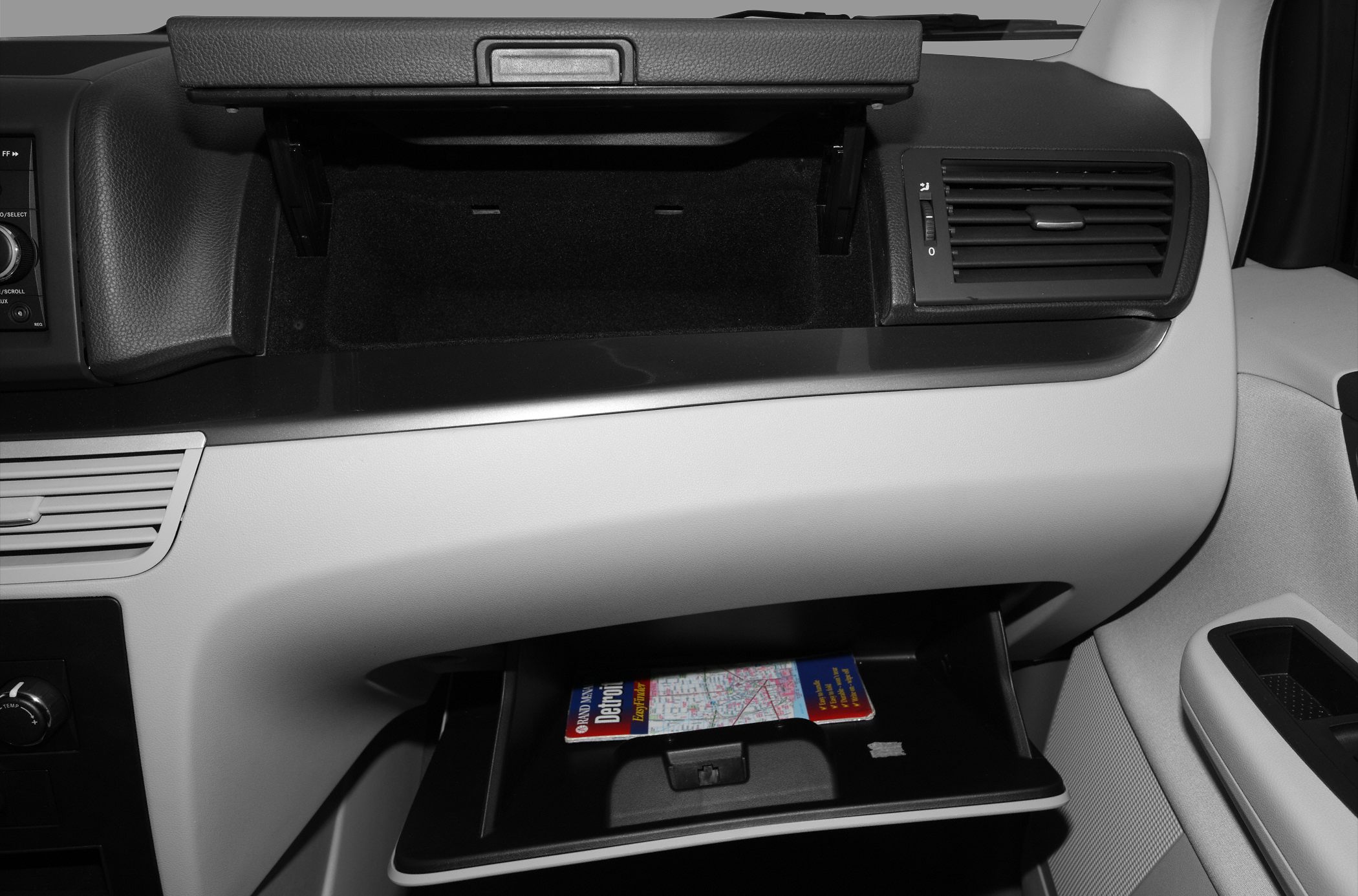 Dual open glove compartments with visible storage interior