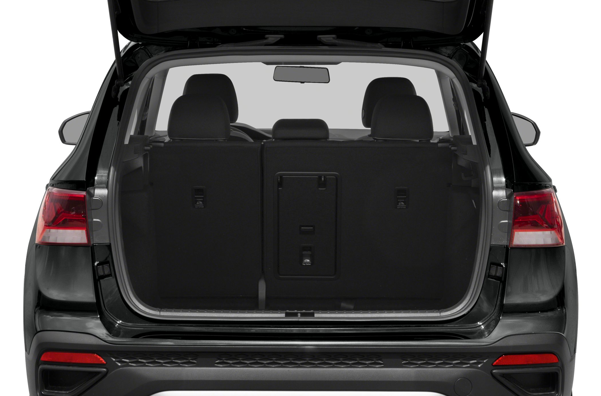 Spacious rear trunk interior with rear seats and folding section