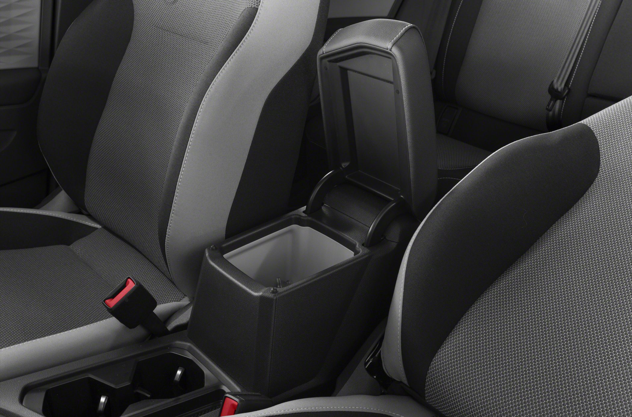 Center console storage compartment and front seats upholstery