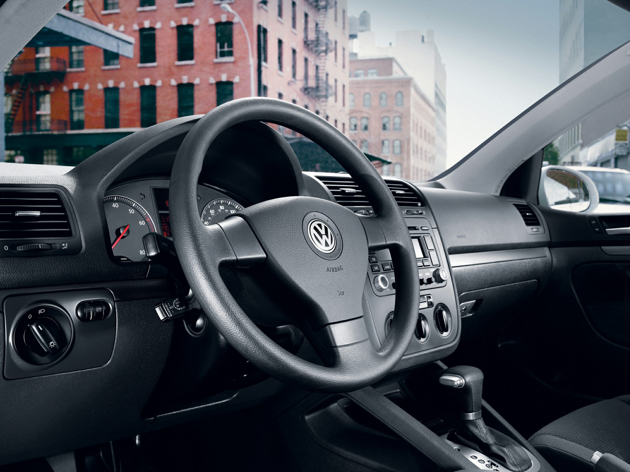 Dashboard and steering wheel with instrument cluster and control console