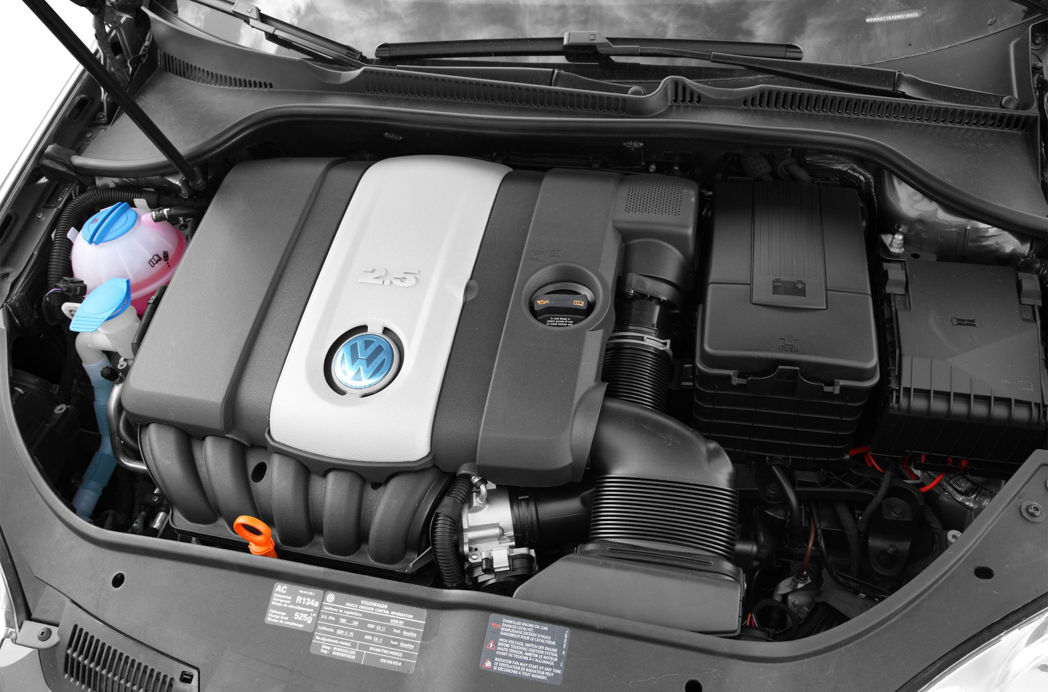 2.5L engine bay with VW emblem and intake system