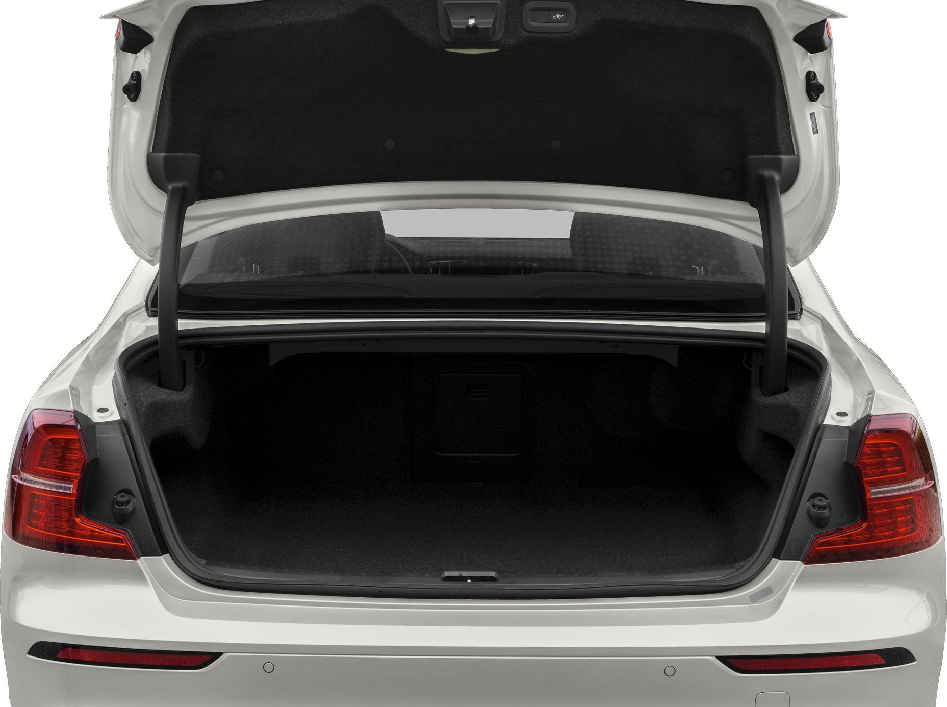 Open rear hatch revealing spacious dark trunk interior and rear lights