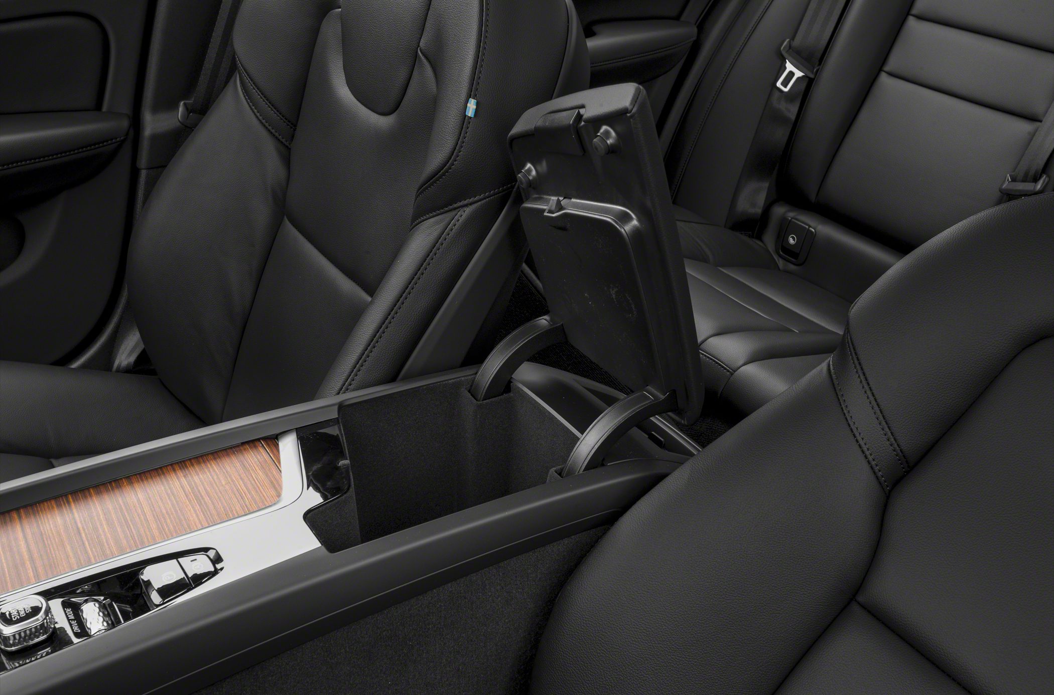 Black leather seats with open center console storage compartment