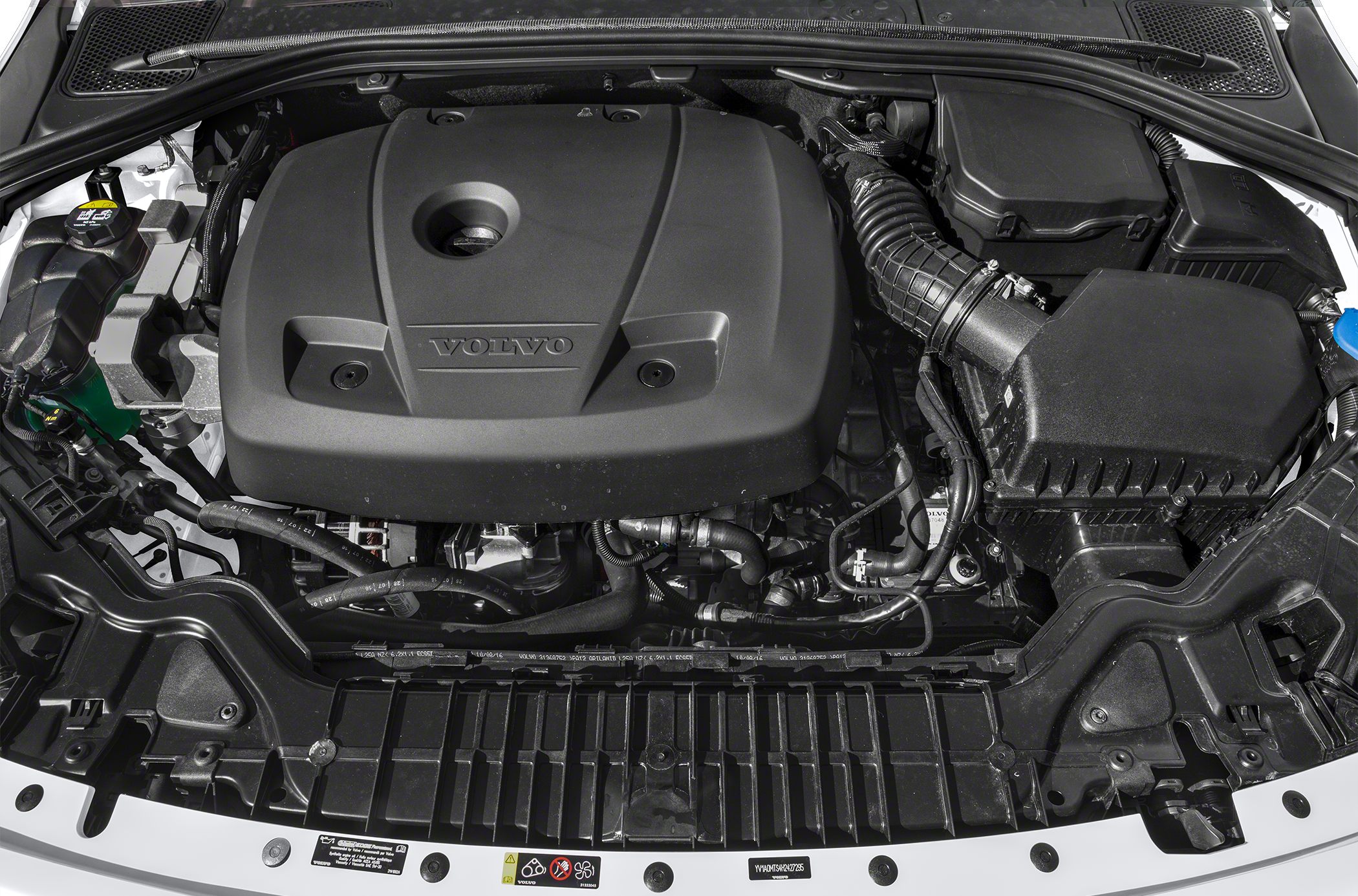 Engine bay with engine cover and air intake components