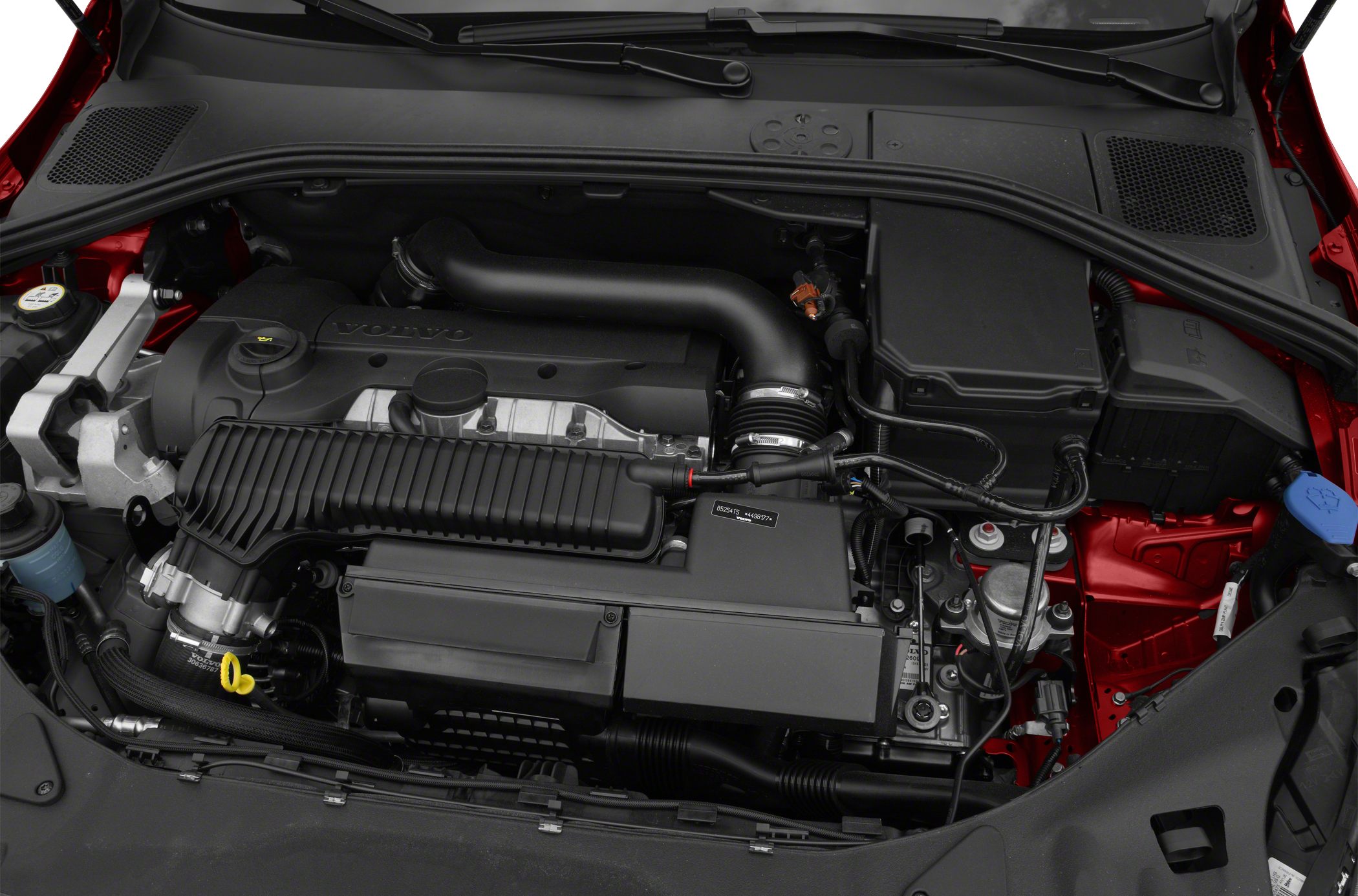 Engine bay with air intake system and visible engine components.