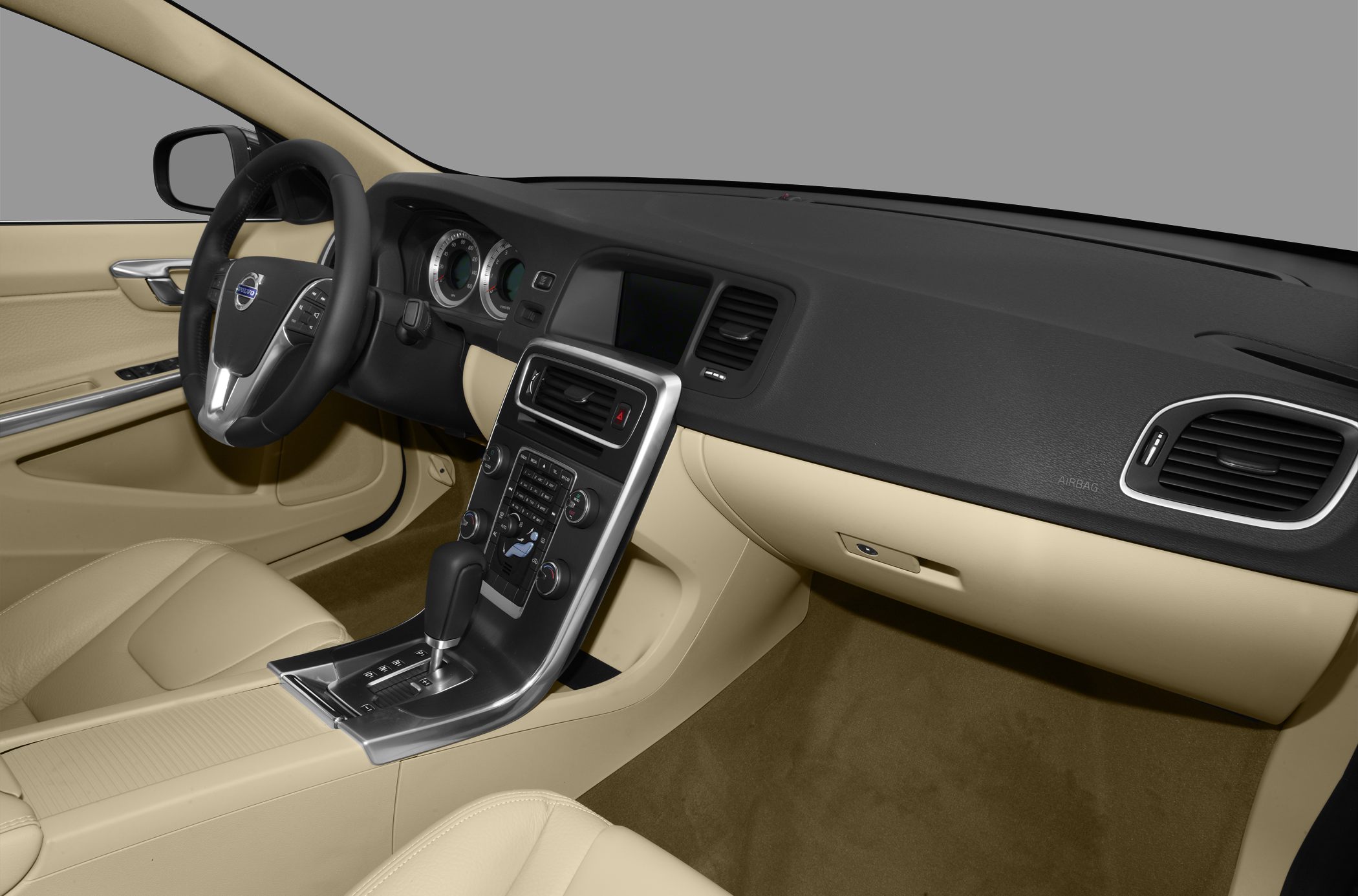 Dashboard, steering wheel, and center console interior view