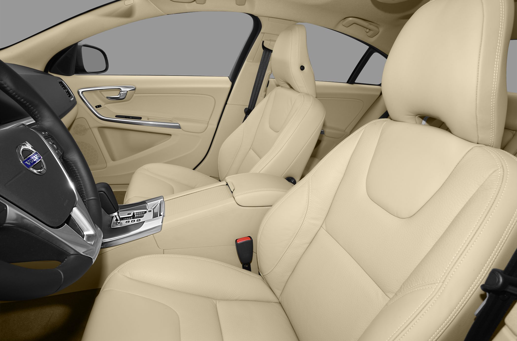 Beige leather seats and chrome accents in car interior