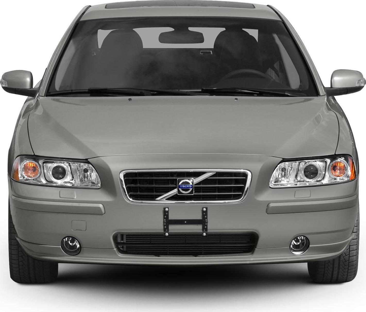 Front view with grill, headlights, and fog lights
