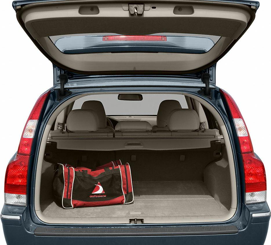 Spacious open trunk interior with rear seats and a duffel bag