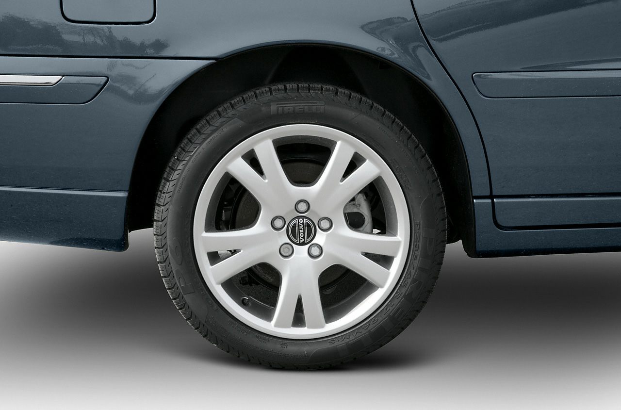 Close-up of alloy wheel and tire with detailed rim design.