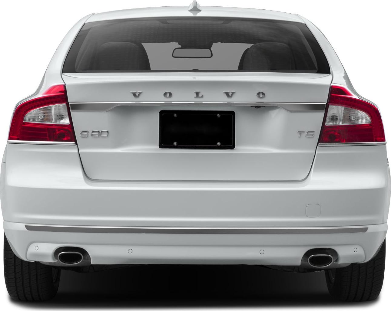 Rear view of sedan featuring taillights, dual exhausts, and trunk details