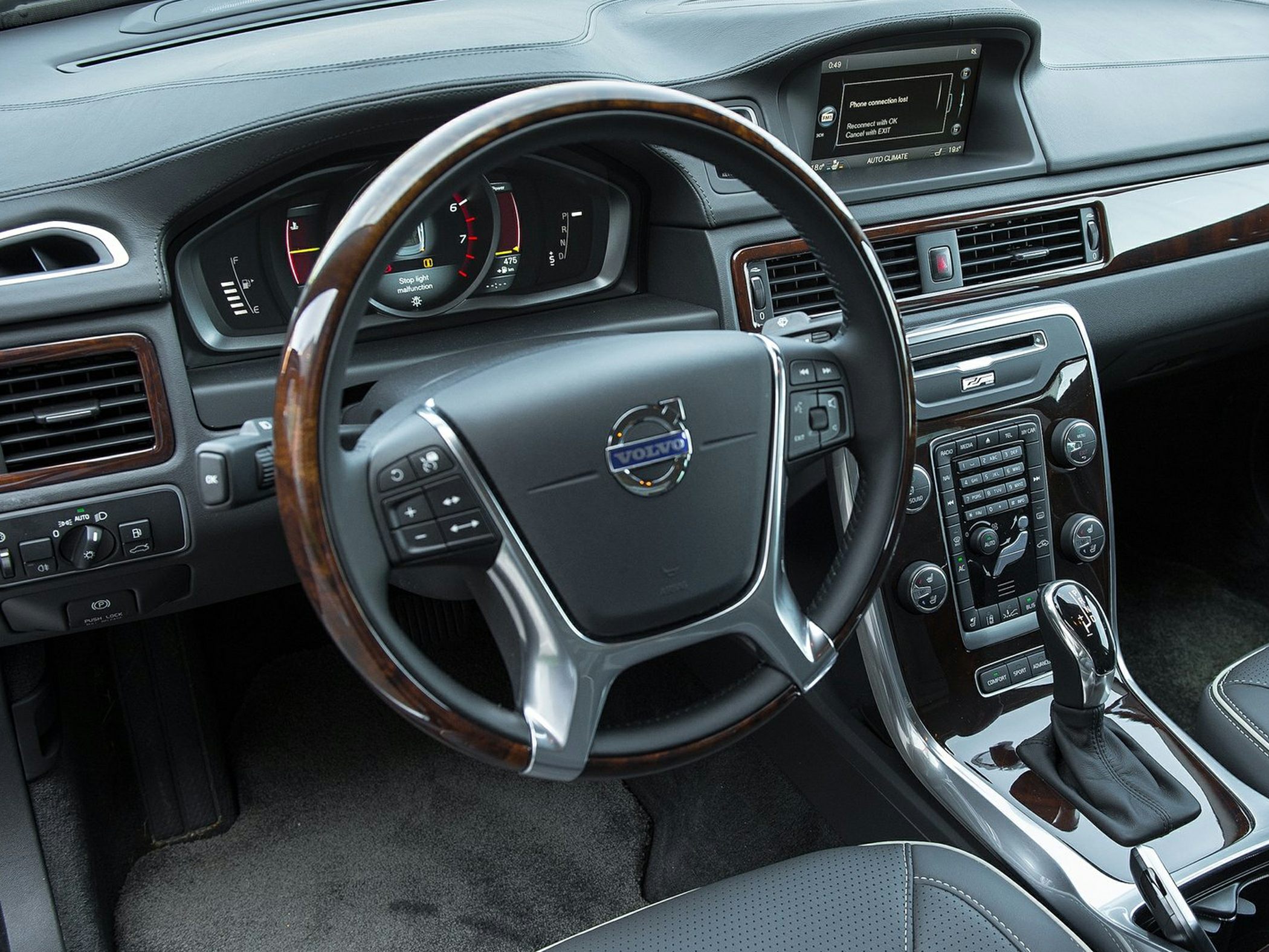 Steering wheel and digital instrument cluster in premium car interior
