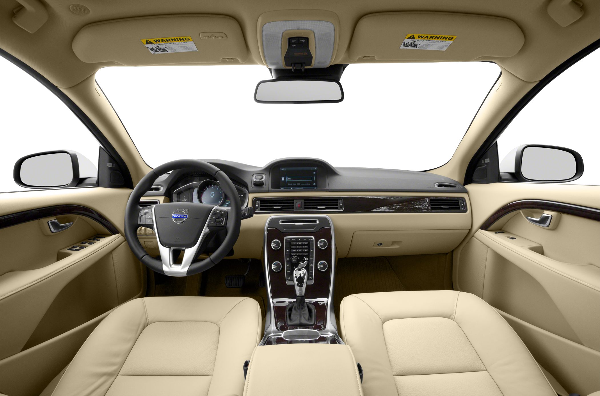 Beige leather interior with wood trim and modern dashboard controls