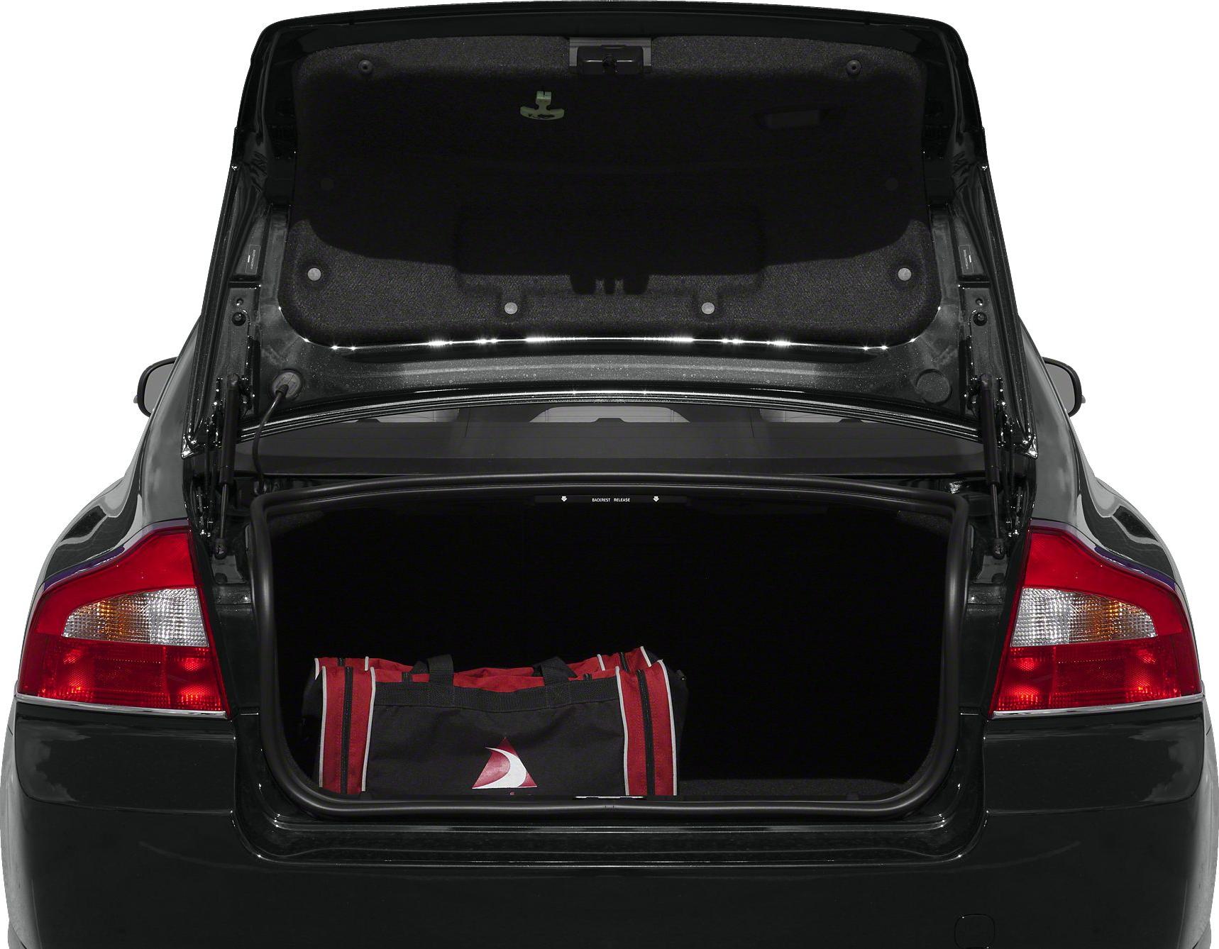 Open trunk with interior lining and red bag