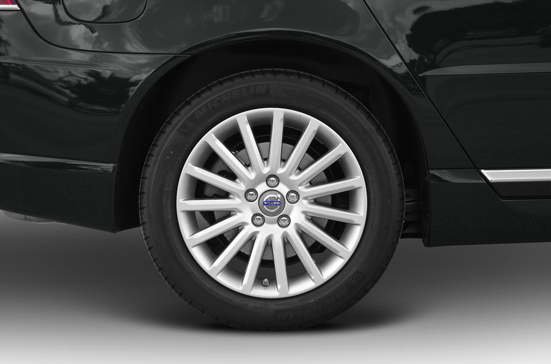 Multi-spoke alloy wheel with Volvo center cap and Michelin tire